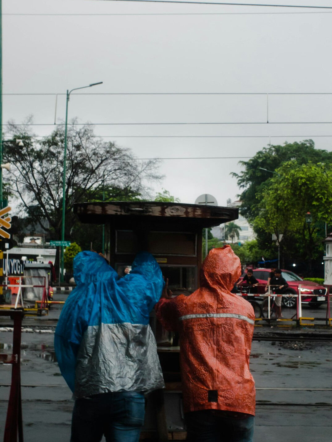 film crew in rain