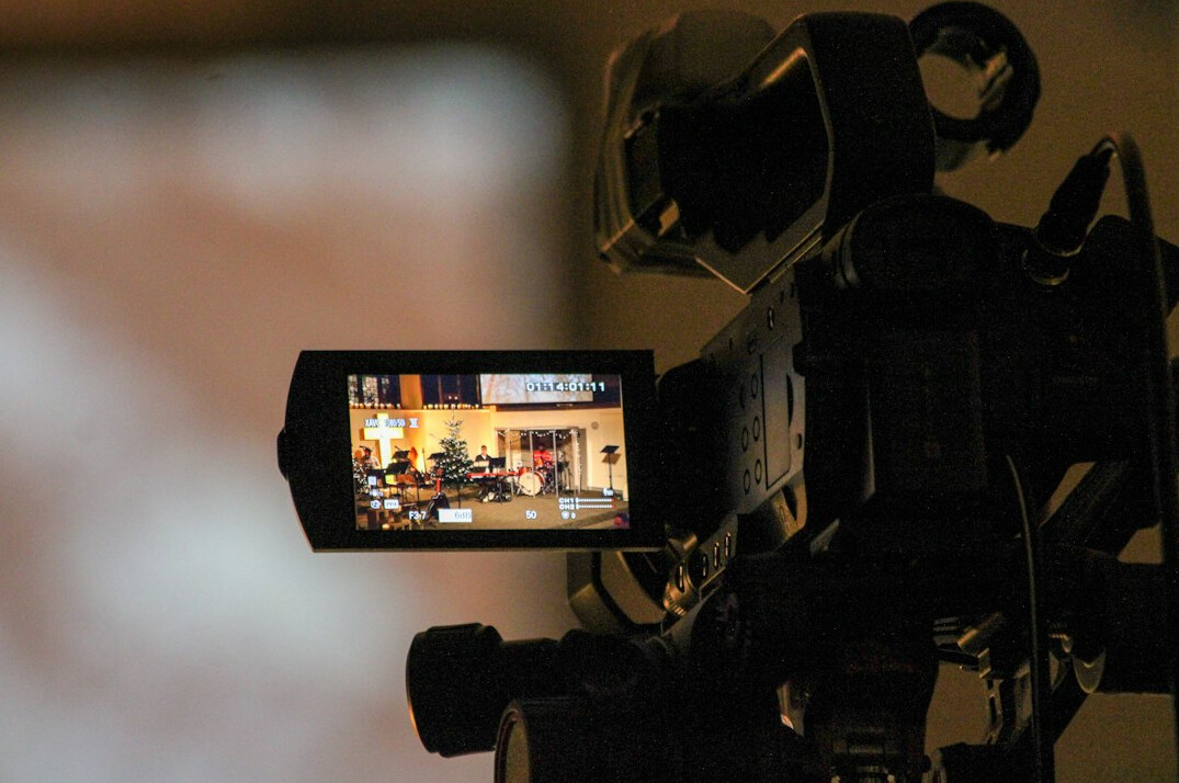Small independent video production studio with camera and lighting equipment